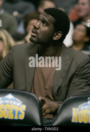 The NBA's number one draft choice, Portland Trailblazers center Greg Oden watches the scoreboard during the first half against the Denver Nuggets at the Pepsi Center in Denver on November 14, 2007.  Oden travels with the team although he had season ending surgery before his first game.   (UPI Photo/Gary C. Caskey) Stock Photo