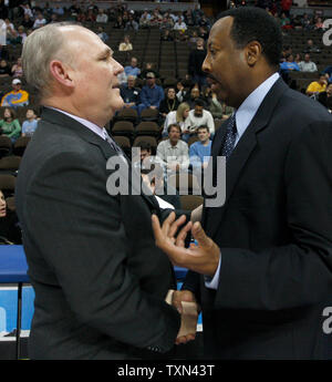 Denver Nuggets head coach George Karl (L) greets visiting Atlanta Hawks head coach Mike Woodson at the Pepsi Center in Denver on January 23, 2008.  (UPI Photo/Gary C. Caskey) Stock Photo