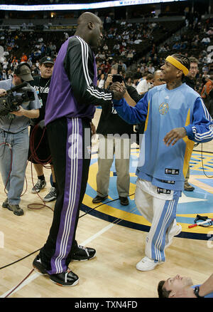 Phoenix Suns center Shaquille O'Neal (L) and Denver Nuggets guard Allen Iverson greet each other during warm ups at the Pepsi Center in Denver on March 5, 2008.   (UPI Photo/Gary C. Caskey) Stock Photo