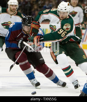 Colorado Avalanche center Peter Forsberg (L) chases Minnesota Wild center Pierre-Marc Bouchard in the first period during the Western Conference game three quarterfinals at the Pepsi Center in Denver on April 14, 2008.     (UPI Photo/Gary C. Caskey) Stock Photo