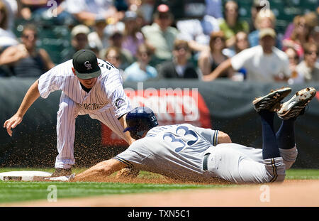 Milwaukee Brewers' Ryan Braun (8), Gabe Kapler (33) and Mike Cameron,  center, celebrate after the ninth inning of a baseball game against the  Pittsburgh Pirates on Sunday, July 6, 2008, in Milwaukee.