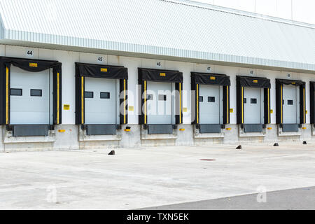 Truck Loading docks at warehouse. Stock Photo