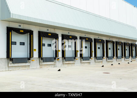 Truck Loading docks at warehouse. Stock Photo
