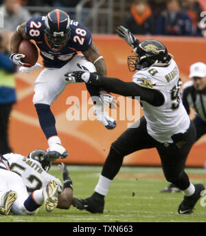 Oakland Raiders running back Michael Bush stretches during pre-game warm  ups at Invesco Field at Mile High on October 24, 2010 in Denver. UPI/Gary  C. Caskey Stock Photo - Alamy