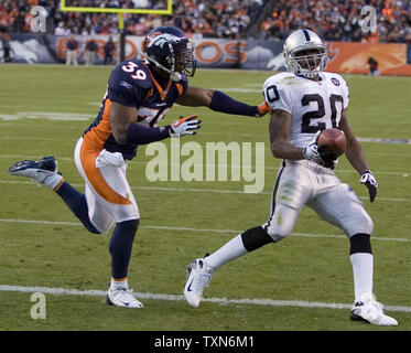 Denver Broncos safety Vernon Fox looks on during a preseason NFL football  game against the Chicago Bears at Invesco Field at Mile High in Denver,  Sunday, Aug. 30, 2009. (AP Photo/Jack Dempsey