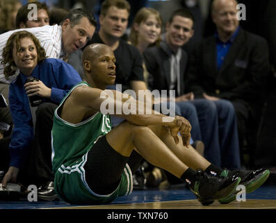 Boston Celtics guard Ray Allen sits on the floor after being fouled by Denver Nuggets guard Anthony Carter during the second half at the Pepsi Center in Denver on February 23, 2009.   (UPI Photo/Gary C. Caskey) Stock Photo