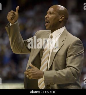 New Orleans Hornets head coach Byron Scott gestures to his team against the Denver Nuggets during the first quarter  in game one of their opening round series at the Pepsi Center in Denver on April 19, 2009.    (UPI Photo/Gary C. Caskey) Stock Photo