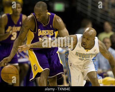 Denver Nuggets guard Anthony Carter (R) knocks the ball away from Los Angeles Lakers guard Kobe Bryant in the first half during game six of the Western Conference Finals at the Pepsi Center in Denver on May 29. 2009.   (UPI Photo/Gary C. Caskey) Stock Photo