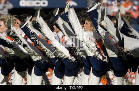 The Denver Broncos cheerleaders perform in Christmas costumes during the  second half at Invesco Field at Mile High in Denver on December 20, 2009.  Oakland beat Denver 20-19. UPI/Gary C. Caskey Stock