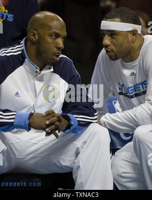 Denver Nuggets guard Chauncey Billups (L) talks with teammate Kenyon Martin before the game against the Boston Celtics at the Pepsi Center on February 21, 2010 in Denver.  The Nuggets beat the Celtics 114-105.       UPI/Gary C. Caskey Stock Photo