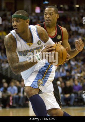 Portland Trail Blazers' Marcus Camby (23) looks to pass the ball as ...