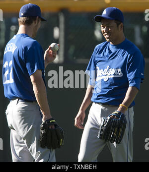 New York Mets third baseman David Wright squats during pre-game warm ups at  Coors Field in Denver on September 1, 2009. Wright returned to the lineup  after returning from the 15-day disabled