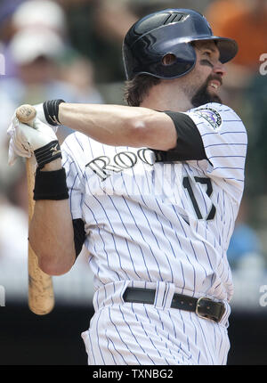 Colorado Rockies first baseman Todd Helton singles in the fourth inning against the Houston Astros at Coors Field on June 10, 2010 in Denver.    UPI/Gary C. Caskey Stock Photo