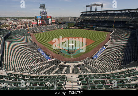 A fan's view from the upper deck behind home plate is shown at