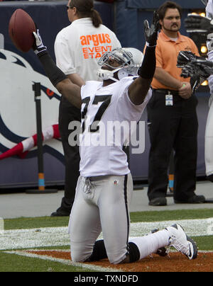 Oakland Raiders Chris Johnson (37) goes up for an interception in the third  quarter of the Oakland Raiders and Kansas City Chiefs game at the  Oakland-Alameda County Coliseum in Oakland, Calif. on