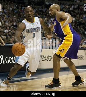 Denver Nuggets guard Chauncey Billups (1) drives against Los Angeles Lakers guard Derek Fisher during the first quarter at the Pepsi Center in Denver on November 11, 2010.  The Lakers look to remain undefeated.       UPI/Gary C. Caskey Stock Photo
