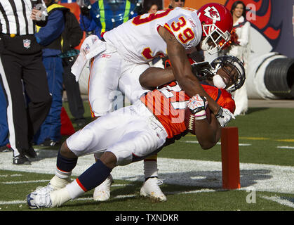 Kansas City Chiefs cornerback Brandon Carr (39) takes down San Diego  Chargers running back Darren Sproles (43) during the Chargers 37-7 victory  over the Chiefs at Arrowhead Stadium in Kansas CIty, Missouri. (