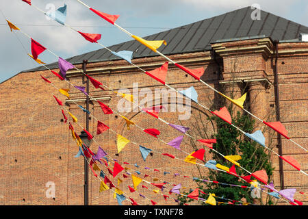 colored flags  festival celebration party Stock Photo