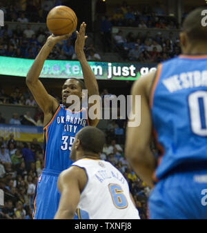 Oklahoma City Thunder forward Kevin Durant scores three of his 26 points against the Denver Nuggets in the Western Conference playoffs-First Round game three at the Pepsi Center in Denver on April 23, 2011.  The Thunder take a 3-0 series lead over the Nuggets with a 97-94 win.      UPI/Gary C. Caskey Stock Photo