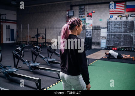 Young couple working out in gym Stock Photo