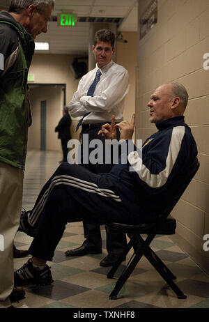 Denver Nuggets head coach George Karl talks to his players in the third ...