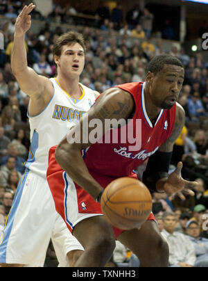 Denver Nuggets forward Danilo Gallinari fouls Los Angeles Clippers center DeAndre Jordan during the first quarter at the Pepsi Center on January 29, 2012 in Denver.        UPI/Gary C. Caskey Stock Photo