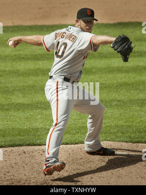 The San Francisco Giants' Tyler Colvin celebrates scoring on a Brandon  Crawford single off Arizona Diamondbacks pitcher Mike Bolsinger in the  second inning at AT&T Park in San Francisco on Friday, July