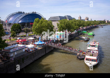 landing stage and the Musical Dome theater, Cologne, Germany.  Schiffsanleger und das Zelttheater Musical Dome, Koeln, Deutschland. Stock Photo