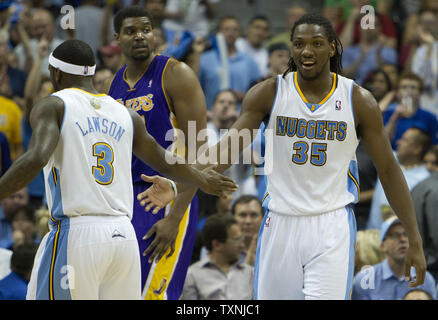 Denver Nuggets Kenneth Faried (35) and Ty Lawson (3) celebrate a run against the Los Angeles Lakers in the third quarter during the NBA Western Conference playoffs first round game six at the Pepsi Center in Denver on May 10, 2012.  Denver beat Los Angeles to even the series at 3-3.     UPI/Gary C. Caskey Stock Photo