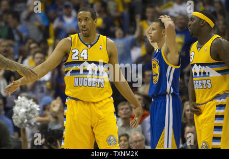 Stephen Curry of the Golden State Warriors poses with the MTN Dew