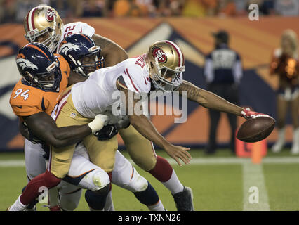 Denver Broncos linebacker DeMarcus Ware (94) sacks San Francisco 49ers quarterback Colin Kaepernick in the end zone for a safety during the second quarter during pre-season game three at Sports Authority Field at Mile High in Denver on August 29, 2015.  Photo by Gary C. Caskey/UPI Stock Photo