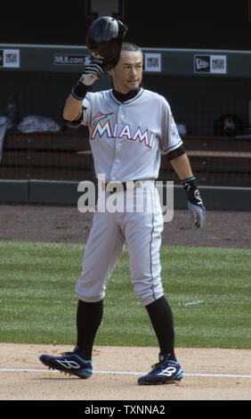 Miami Marlins outfielder Ichiro Suzuki tips his cap after hitting a triple for 3,000 career at Coors Field in Denver on August 7, 2016.  Ichiro becomes the 30th player in Major League history to record 3,000 hits.  Photo by Gary C. Caskey/UPI Stock Photo