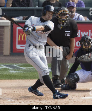 Miami Marlins outfielder Ichiro Suzuki hits a triple in the seventh inning to notch his 3,000 career hit at Coors Field in Denver on August 7, 2016.  Ichiro becomes the 30th player in Major League history to record 3,000 hits.  Photo by Gary C. Caskey/UPI Stock Photo