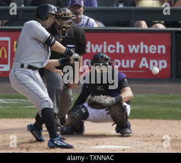 Miami Marlins outfielder Ichiro Suzuki hits a triple in the seventh inning to notch his 3,000 career hit at Coors Field in Denver on August 7, 2016.  Ichiro becomes the 30th player in Major League history to record 3,000 hits.  Photo by Gary C. Caskey/UPI Stock Photo