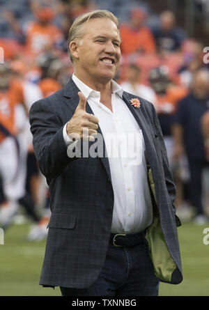 Denver Broncos John Elway, executive vice-president of football operations and general manager,  gestures toward friends before pre-season game three at Sports Authority Field at Mile High in Denver on August 27, 2016.   Photo by Gary C. Caskey/UPI Stock Photo