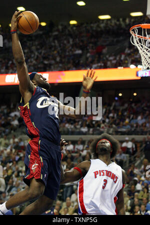 Cleveland Cavaliers forward LeBron James slam dunks the ball over Detroit Pistons center Ben Wallace in the first quarter at The Palace of Auburn Hills in Auburn Hills, Mi on May 9, 2006.  (UPI Photo/Scott R. Galvin) Stock Photo