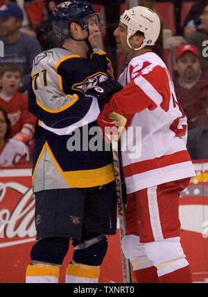 Nashville Predators Jean -Pierrre Dumont (71) and Detroit Red Wings Chris Chelios (24) confront each other after a hard hit at Joe Louis Arena on March 14, 2007.  The Red Wings defeated the Predators 4-2. (UPI Photo/Matthew Mitchell) Stock Photo