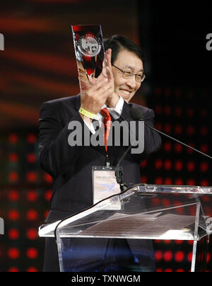 Dr. Hyun-Soon Lee, Hyundai's president of research and product development, accepts the North American Car-of-the-Year Award for the Hyundai Genesis at the North American International Auto Show at the Cobo Center on January 11, 2009 in Detroit, Michigan. (UPI Photo/Brian Kersey) Stock Photo