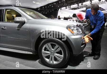 A worker cleans a Mercedes GL 350 Blue Tec for display at the 2010 North American International Auto Show at the COBO Center in Detroit, MI., January 11, 2010. UPI Photo/Mark Cowan Stock Photo