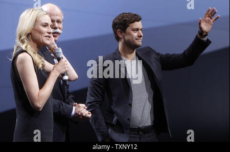 Actress Diane Kruger, left, Chairman Dr. Dieter Zetsche, and actor Joshua Jackson, right, present the new Mercedes E-Class during the 2013 North American International Auto Show at the Cobo Center in Detroit, January 14, 2013. UPI/Mark Cowan Stock Photo