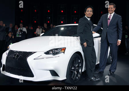 Lexus chief engineer Junichio Furuyama, left, and Mark Templin, group vice president and general manager of Lexus posed against the Lexus IS 350 sport during the 2013 North American International Auto Show at the Cobo Center in Detroit, January 15, 2013. UPI/Mark Cowan Stock Photo