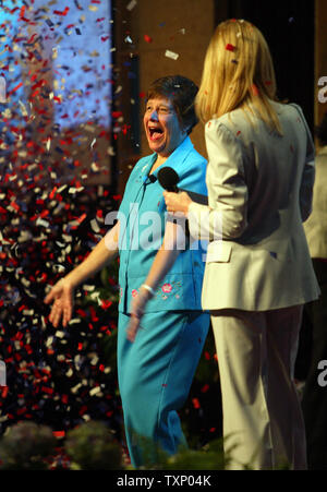 Homemaker Carolyn Gurtz of Gaithersburg, Maryland reacts after learning her double-delight peanut butter cookies are the $1 million grand-prize winners of the 43rd Pillsbury Bake-Off Contest in Dallas on April 15, 2008. Gurtz’ recipe won the sweet treats category before being picked from four other category winners. Food Network personality Sandra Lee made the announcement. (UPI Photo/Robert Hughes) Stock Photo
