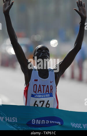 Qatar's Mubarak Hassan Shami wins the gold medal in the men's marathon at the 15th Asian Games in Doha, Qatar on December 10, 2006.  (UPI Photo/Norbert Schiller) Stock Photo