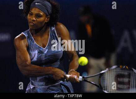 The world No. 1, Serena Williams from the United States returns the ball from her opponent Jie Zheng, the world No. 20, from China on the fourth day of the Women's Dubai Championships,  Wednesday February 18, 2009.  (UPI Photo/Norbert Schiller) Stock Photo
