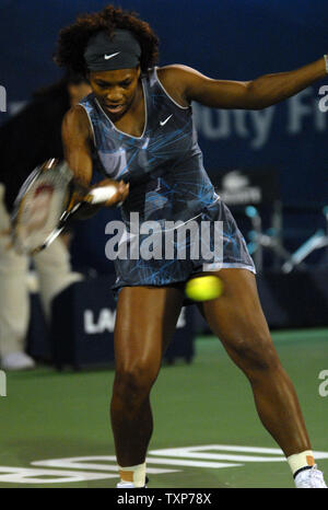 The world No. 1, Serena Williams from the United States returns the ball from her opponent Jie Zheng, the world No. 20, from China on the fourth day of the Women's Dubai Championships,  Wednesday February 18, 2009.  (UPI Photo/Norbert Schiller) Stock Photo
