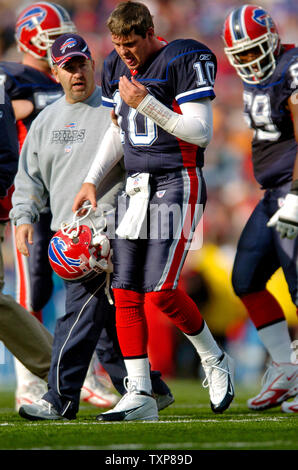 Buffalo Bills quarterback Kelly Holcomb (10) scores on a 1-yard touchdown  run against the Cincinnati Bengals in the second half of an NFL football  game Saturday, Dec. 24, 2005, in Cincinnati. The