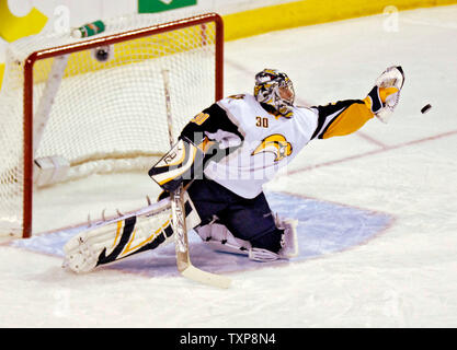 Buffalo Sabres goalie Ryan Miller (30) make a glove save in the first period against the Montreal Canadiens at the Bell Centre in Montreal, Canada on October 23, 2006.  (UPI Photo/Ed Wolfstein) Stock Photo