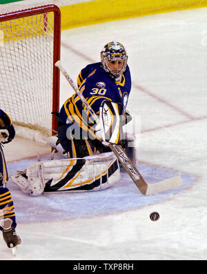 Buffalo Sabres goalie Ryan Miller (30) make a stick save in the first period against the Montreal Canadiens at the Bell Centre in Montreal, Canada on December 9, 2006. (UPI Photo/Ed Wolfstein) Stock Photo