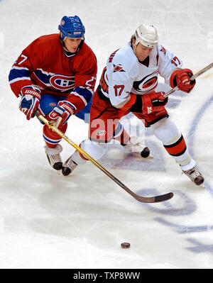Carolina Hurricanes center and team captain Rod Brind'Amour (17) jostles with Montreal Canadiens right wing forward Alexei Kovalev (27) of Russia for control of the puck at the Bell Centre in Montreal, Canada on February 6, 2007. The Hurricanes defeated the Canadiens 2-1. (UPI Photo/Ed Wolfstein) Stock Photo