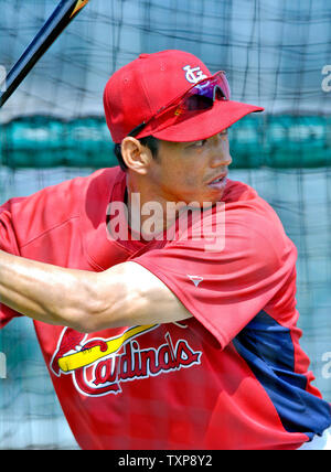 St. Louis Cardinals outfielder So Taguchi waits for the game to